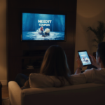 a_cinematic_nighttime_interior_shot_of_a_luxurious_yet_cozy_living_room_softly_lit_by_warm_lamps_an_nqr6ql80b95lbgj5gsf8_3